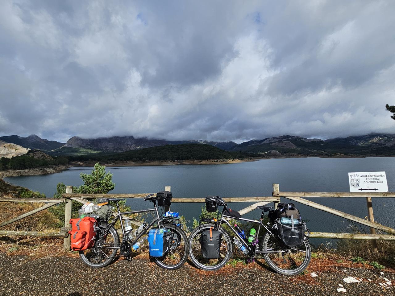 Our bicycles on a fence by a lake